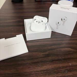 Apple AirPods with Charging Case - White
